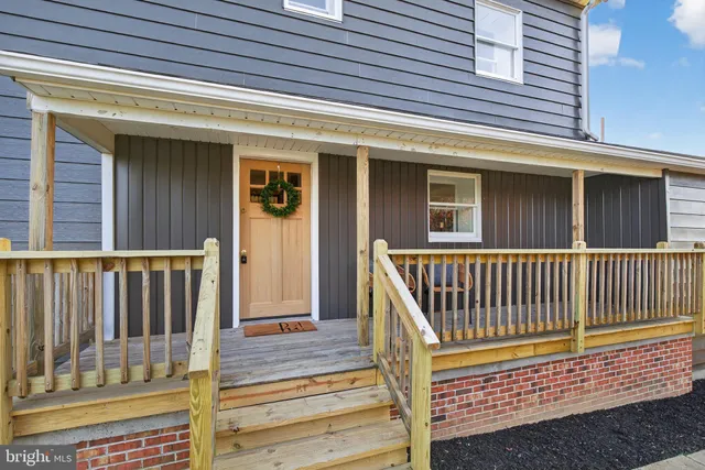 a view of a deck with a large window
