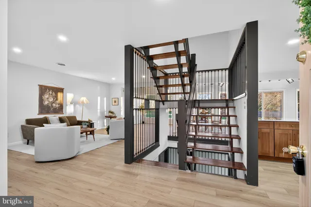 a livingroom with furniture and wooden floor