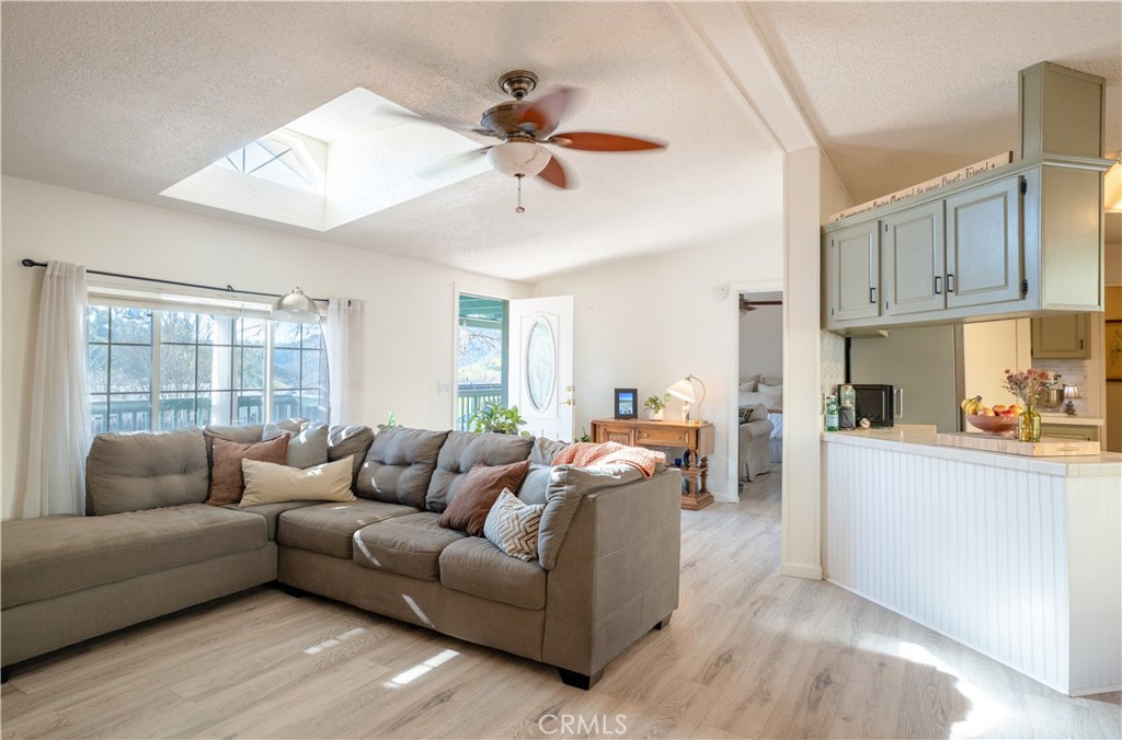 4114 Shetland Way Paso Robles, CA 93446 - Photo 3 of 13 a living room with furniture and a large window