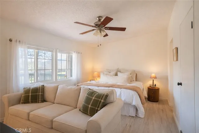 a bed room with a bed and a couch