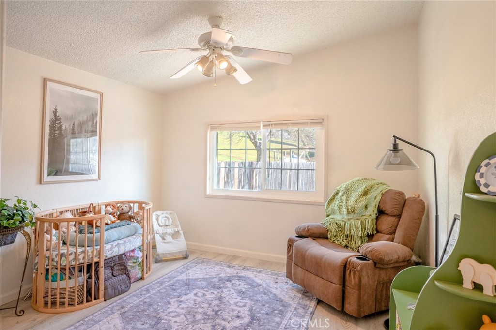 4114 Shetland Way Paso Robles, CA 93446 - Photo 8 of 13 a bedroom with furniture and a window
