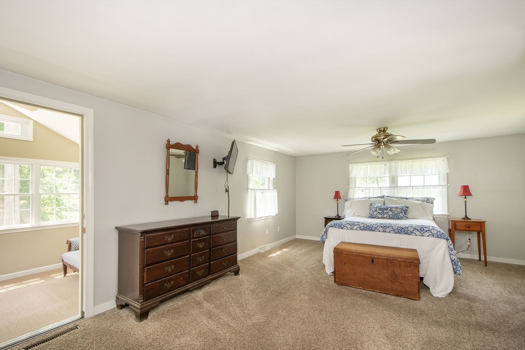 45 Cornet Stetson Road Scituate, MA 02066 - Photo 11 of 23 a bedroom with a bed and a dresser
