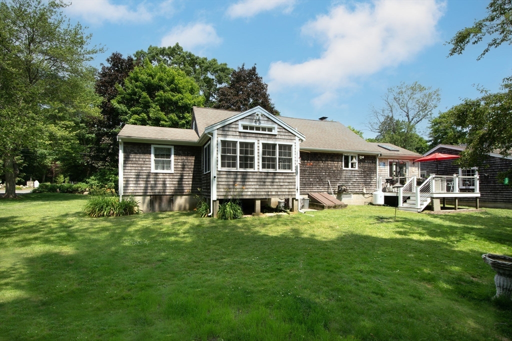45 Cornet Stetson Road Scituate, MA 02066 - Photo 19 of 23 a front view of a house with a garden