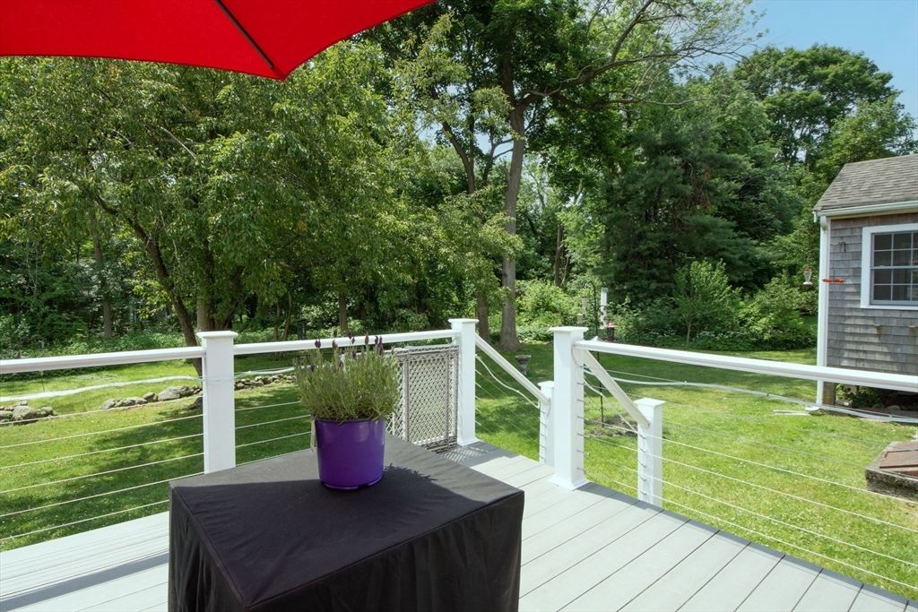 45 Cornet Stetson Road Scituate, MA 02066 - Photo 22 of 23 a view of a deck with couches wooden floor and fence