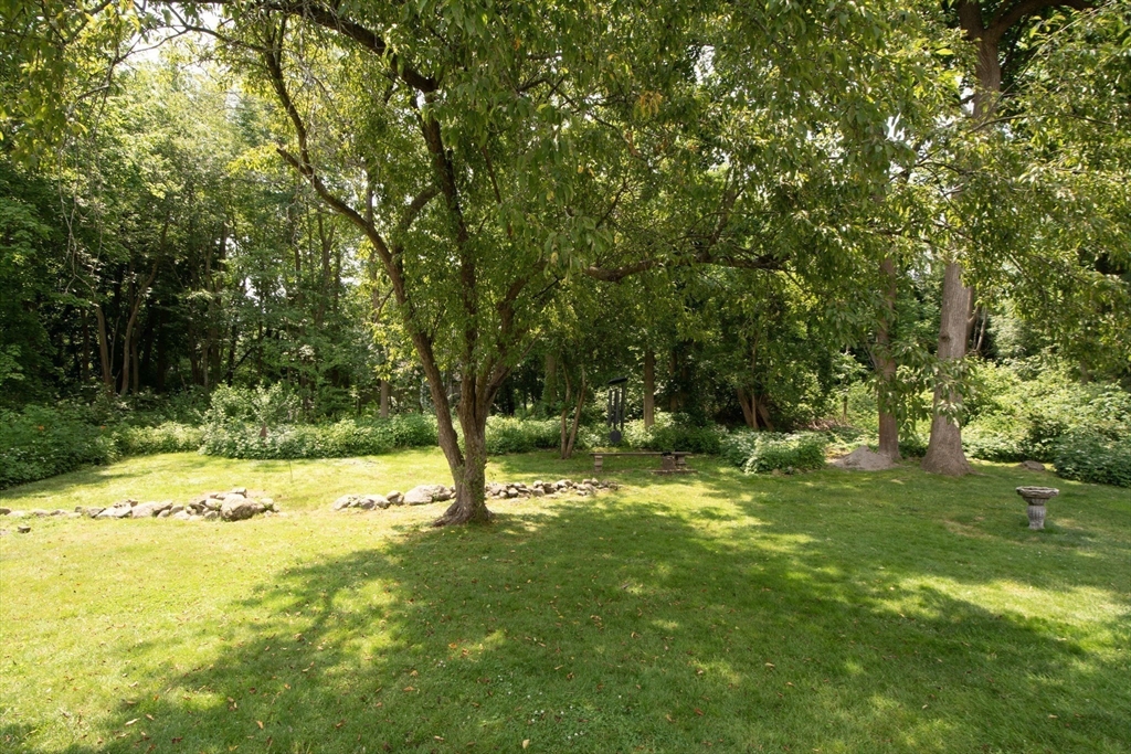 45 Cornet Stetson Road Scituate, MA 02066 - Photo 23 of 23 a view of a backyard with large trees