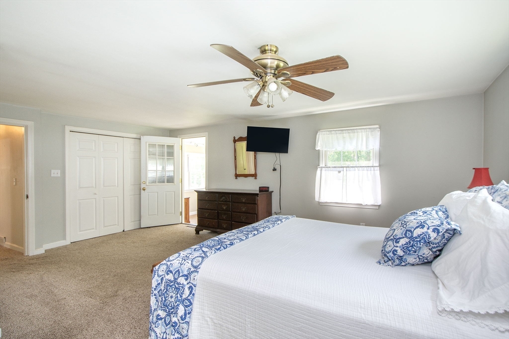 45 Cornet Stetson Road Scituate, MA 02066 - Photo 10 of 23 a bedroom with a large bed and a window
