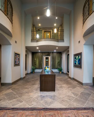 a view of a living room with a large window
