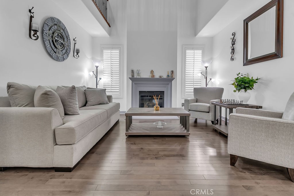 42740 Portraits Lane Temecula, CA 92592 - Photo 16 of 68 a living room with furniture and a fireplace