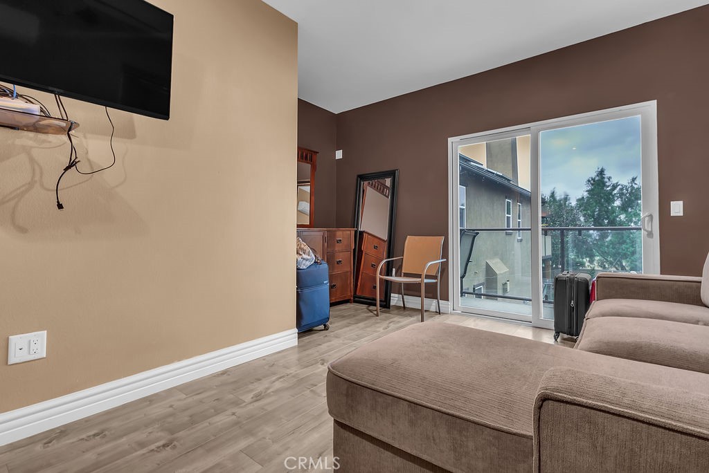 42740 Portraits Lane Temecula, CA 92592 - Photo 27 of 68 a living room with furniture and a table