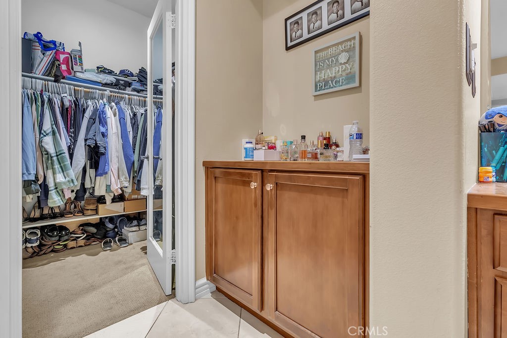42740 Portraits Lane Temecula, CA 92592 - Photo 34 of 68 a view of a closet with storage