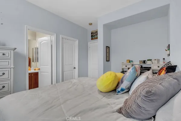 an aerial view of a house with a yard basket ball court and outdoor seating