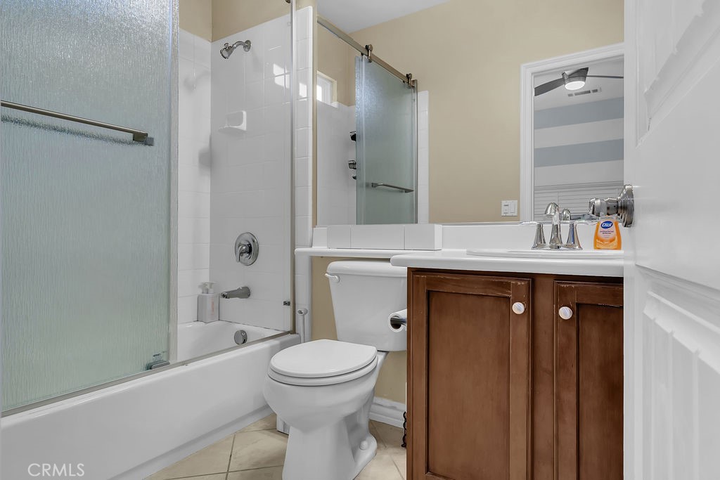 42740 Portraits Lane Temecula, CA 92592 - Photo 48 of 68 a bathroom with a sink a toilet and shower