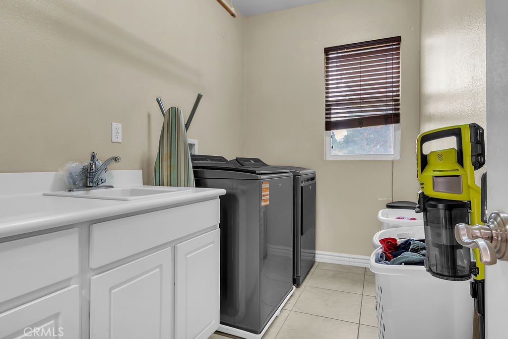 42740 Portraits Lane Temecula, CA 92592 - Photo 49 of 68 a bathroom with a sink and a mirror