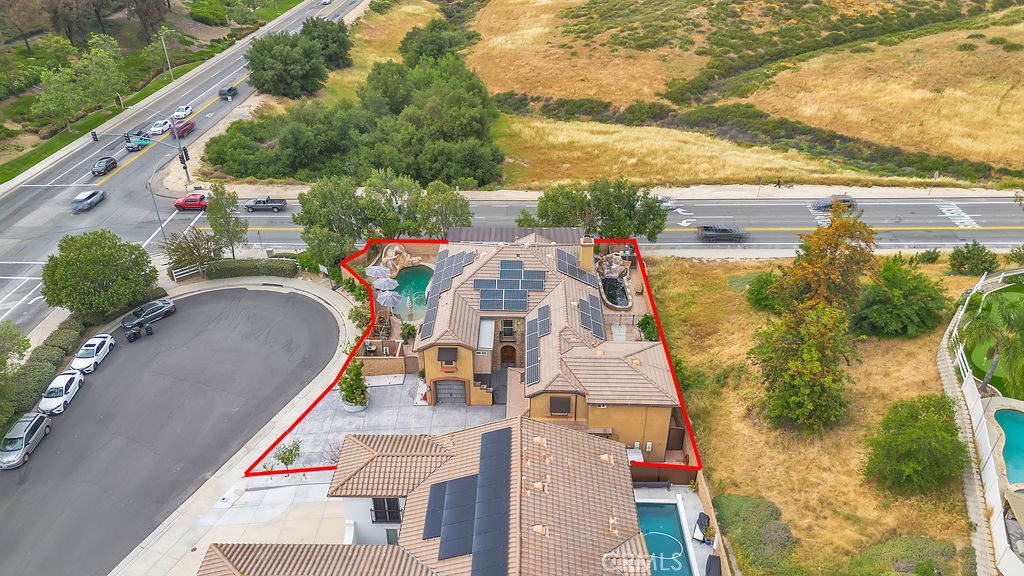 42740 Portraits Lane Temecula, CA 92592 - Photo 62 of 68 an aerial view of a house with a yard basket ball court and outdoor seating