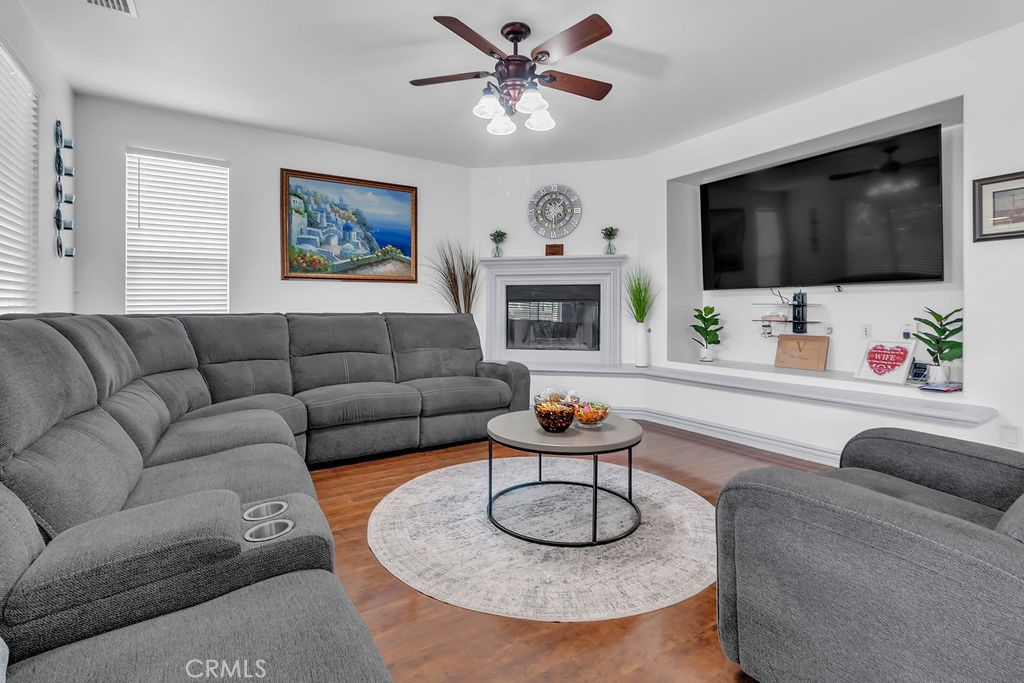 42740 Portraits Lane Temecula, CA 92592 - Photo 7 of 68 a living room with furniture and a flat screen tv