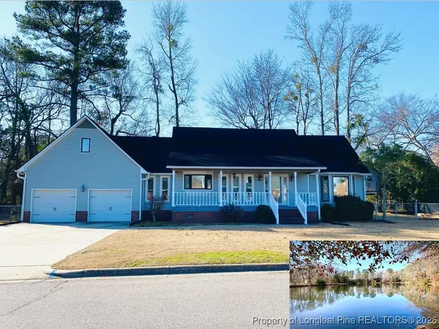 a kitchen with a stove a sink and a microwave