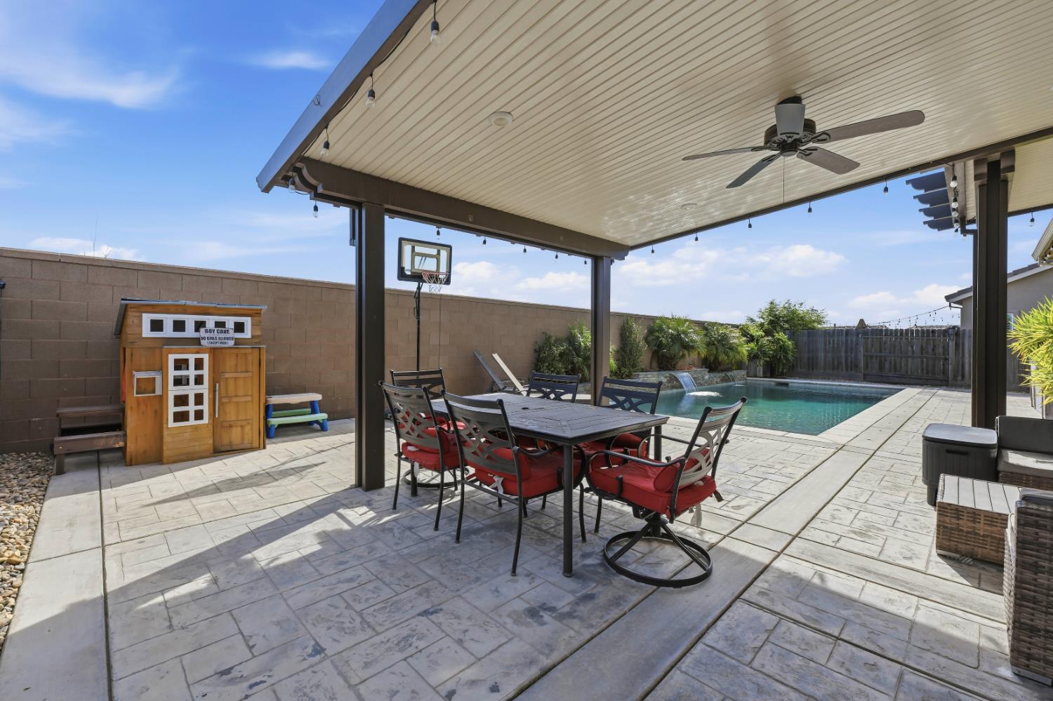 2012 Van Ruiten Drive Lodi, CA 95242 - Photo 38 of 49 a view of a dinning table and chairs in the patio