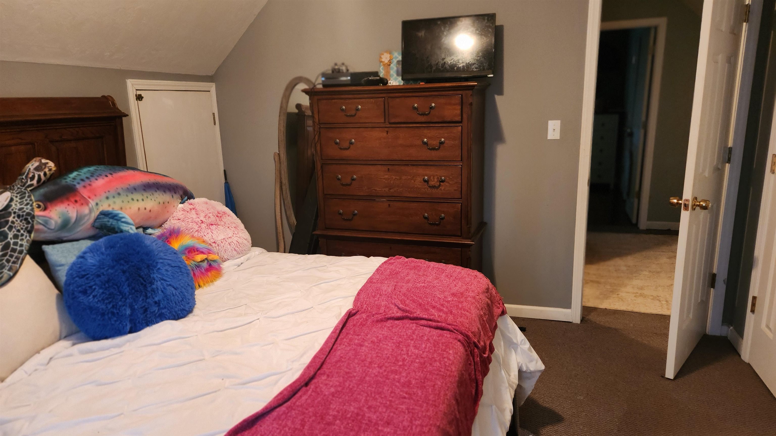 1827 Arp Central Road Ripley, TN 38063 - Photo 13 of 18 Bedroom featuring dark carpet and vaulted ceiling