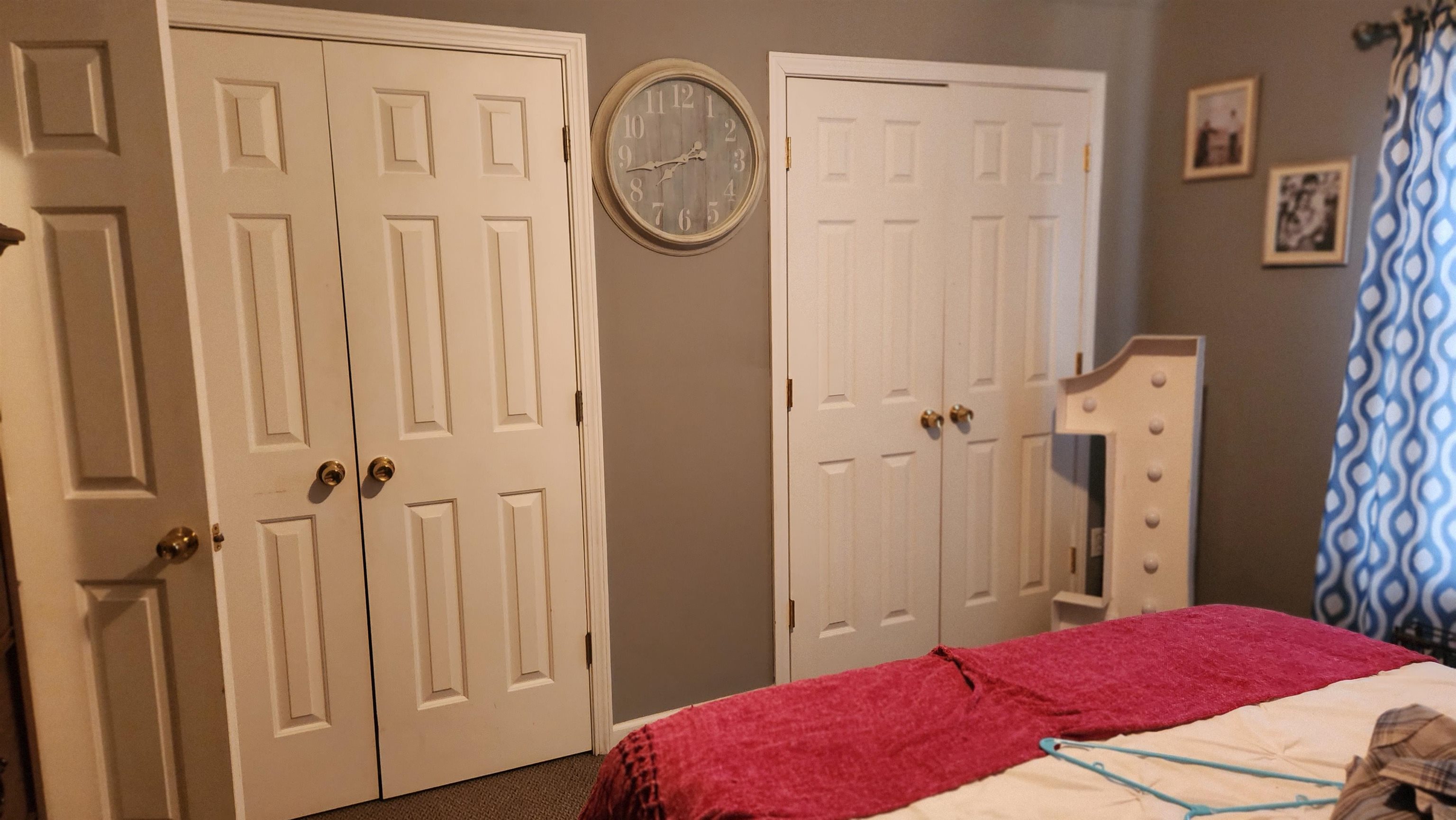 1827 Arp Central Road Ripley, TN 38063 - Photo 15 of 18 Carpeted bedroom featuring multiple closets