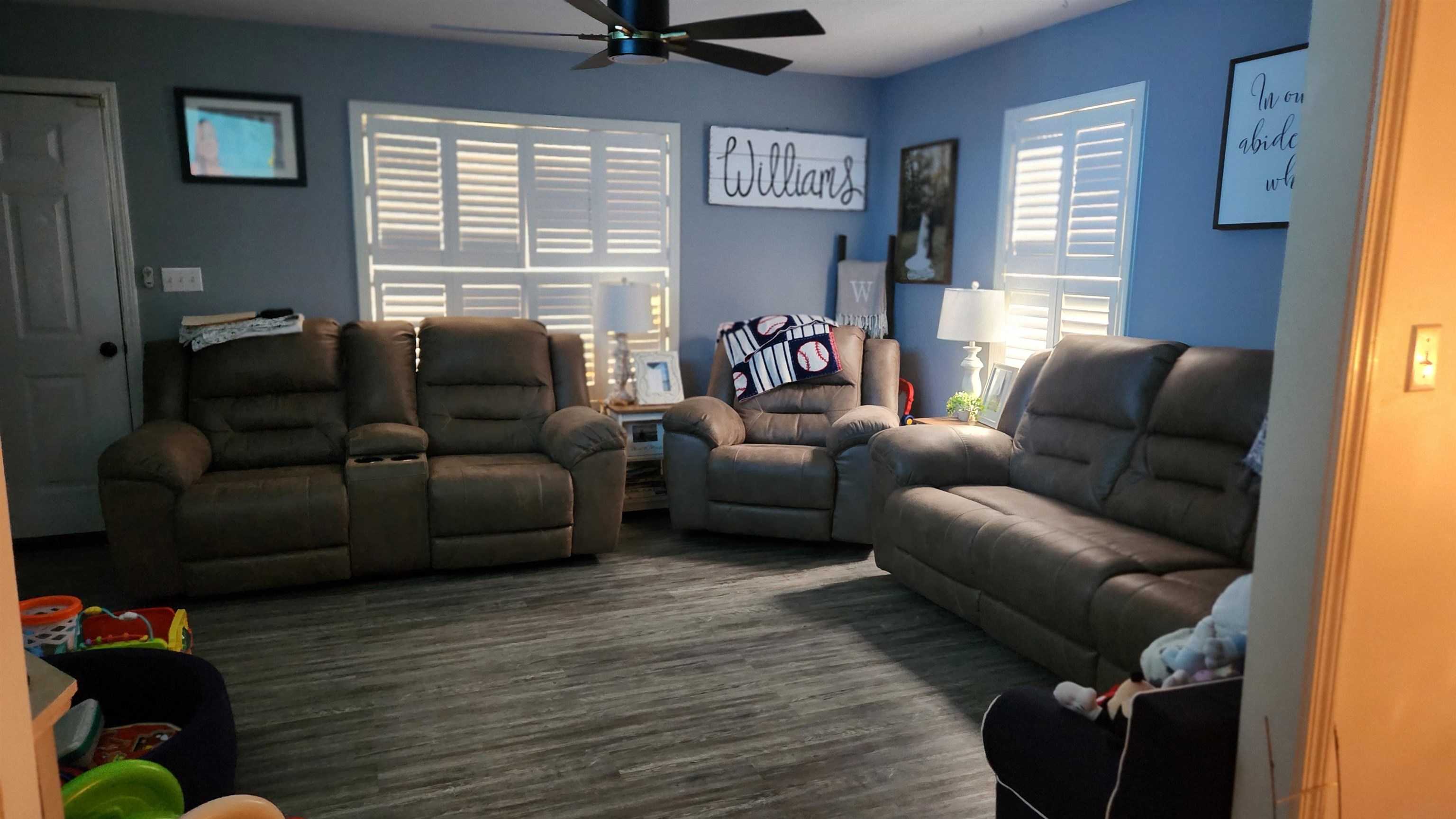 1827 Arp Central Road Ripley, TN 38063 - Photo 3 of 18 Living area with a ceiling fan and wood finished floors