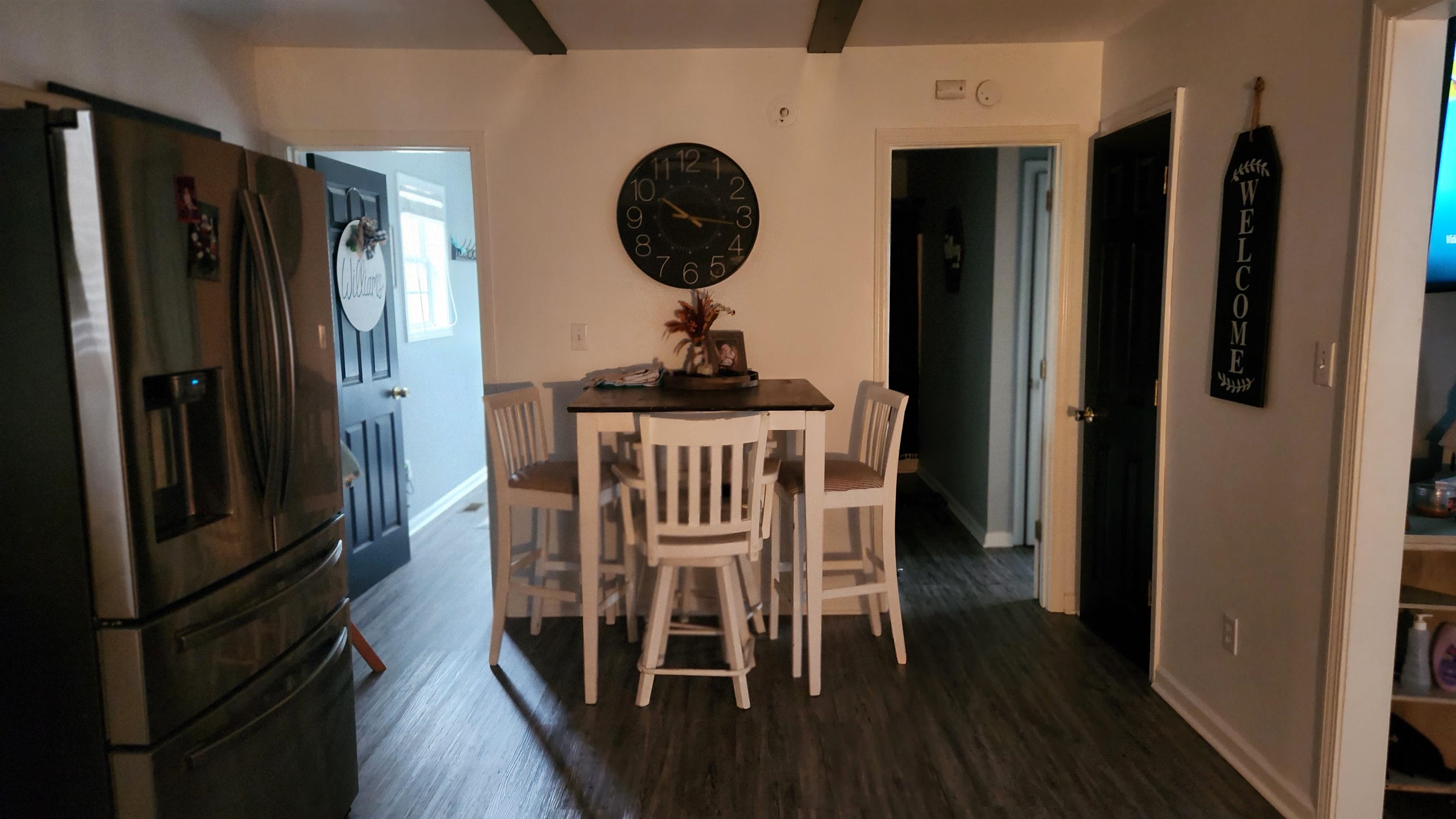 1827 Arp Central Road Ripley, TN 38063 - Photo 6 of 18 Dining space with dark wood-type flooring and baseboards