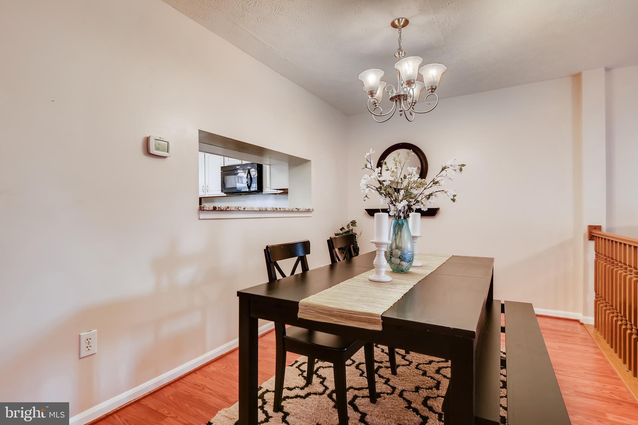 5334 Kelmscot Road Baltimore, MD 21237 - Photo 8 of 33 Dining Room with hardwood floors