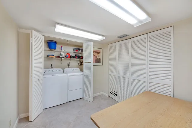 a storage room with washer and dryer