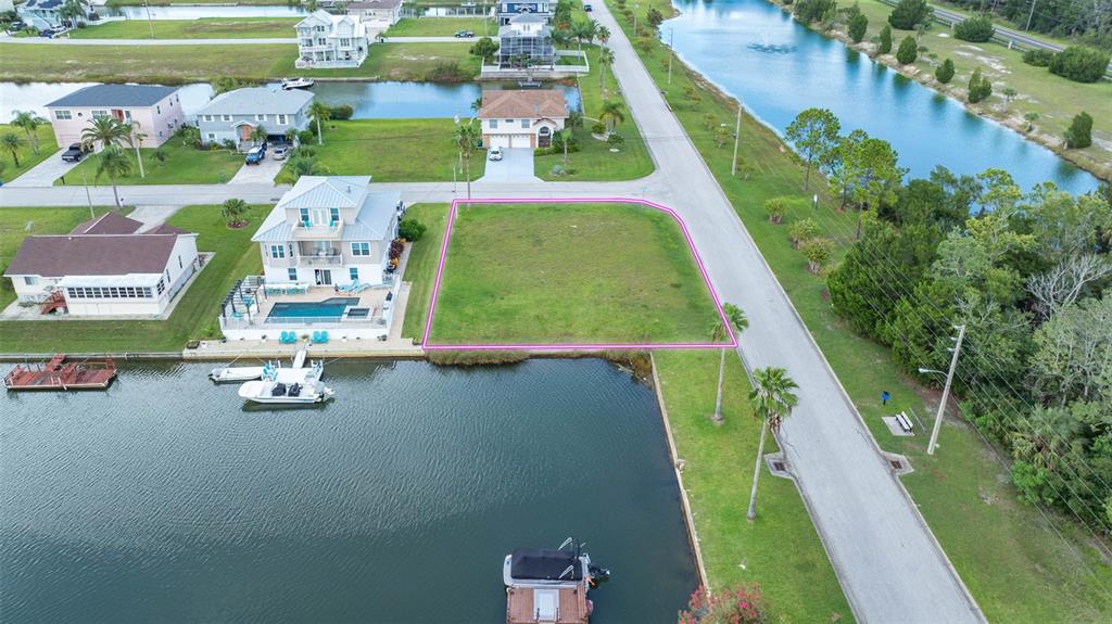 4066 Croaker Drive Hernando Beach, FL 34607 - Photo 5 of 13 an aerial view of a house with a swimming pool