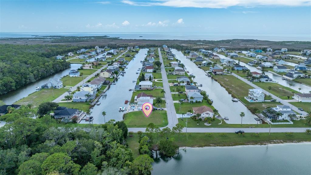 4066 Croaker Drive Hernando Beach, FL 34607 - Photo 7 of 13 an aerial view of a city