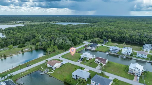 an aerial view of a house with a garden