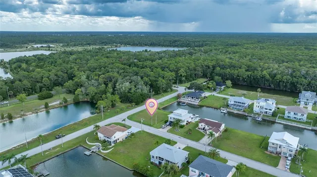 an aerial view of a house with a garden