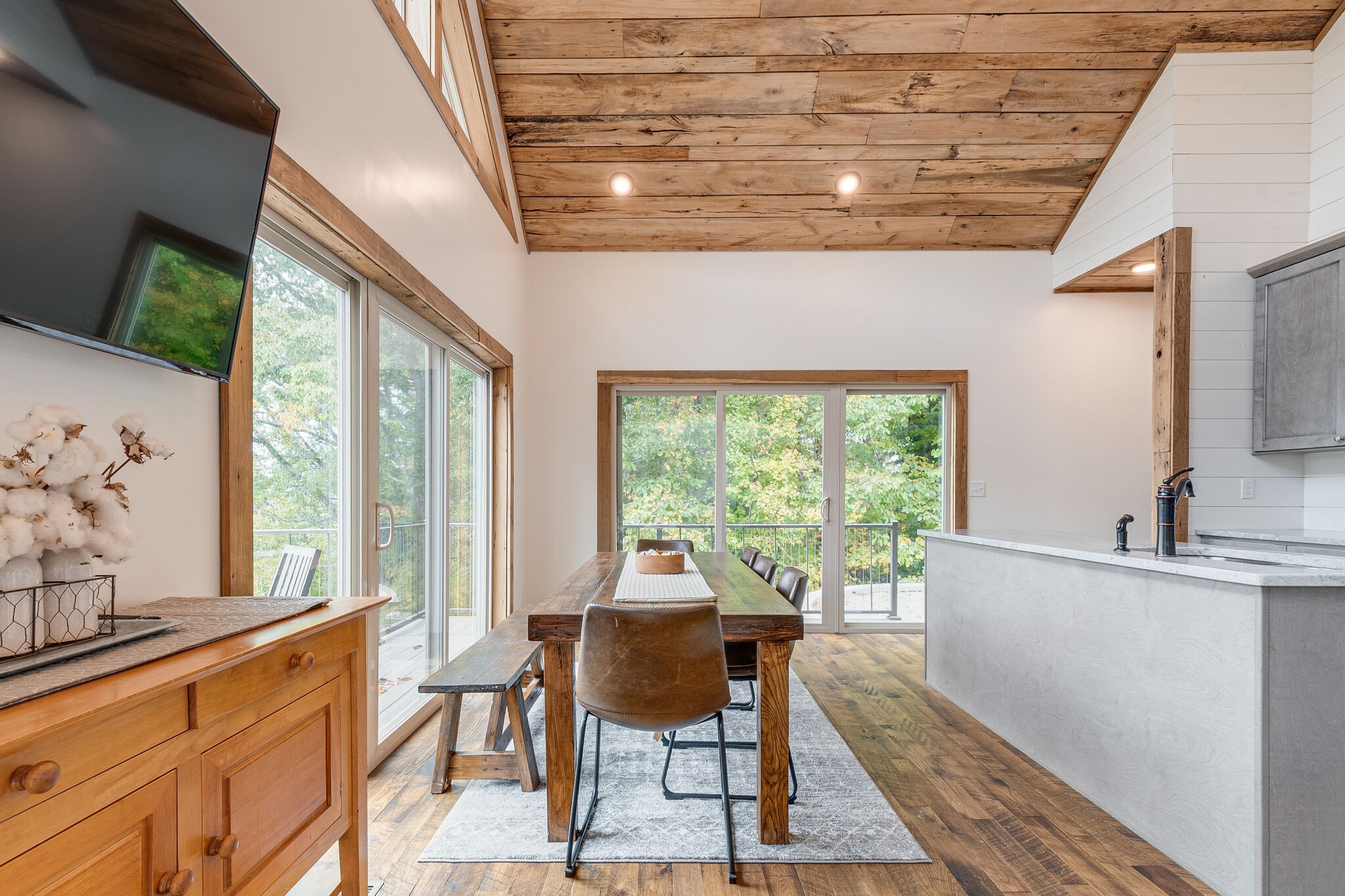 245 Nautilus Point Silver Point, TN 38582 - Photo 13 of 41 a dining room with furniture a chandelier and wooden floor