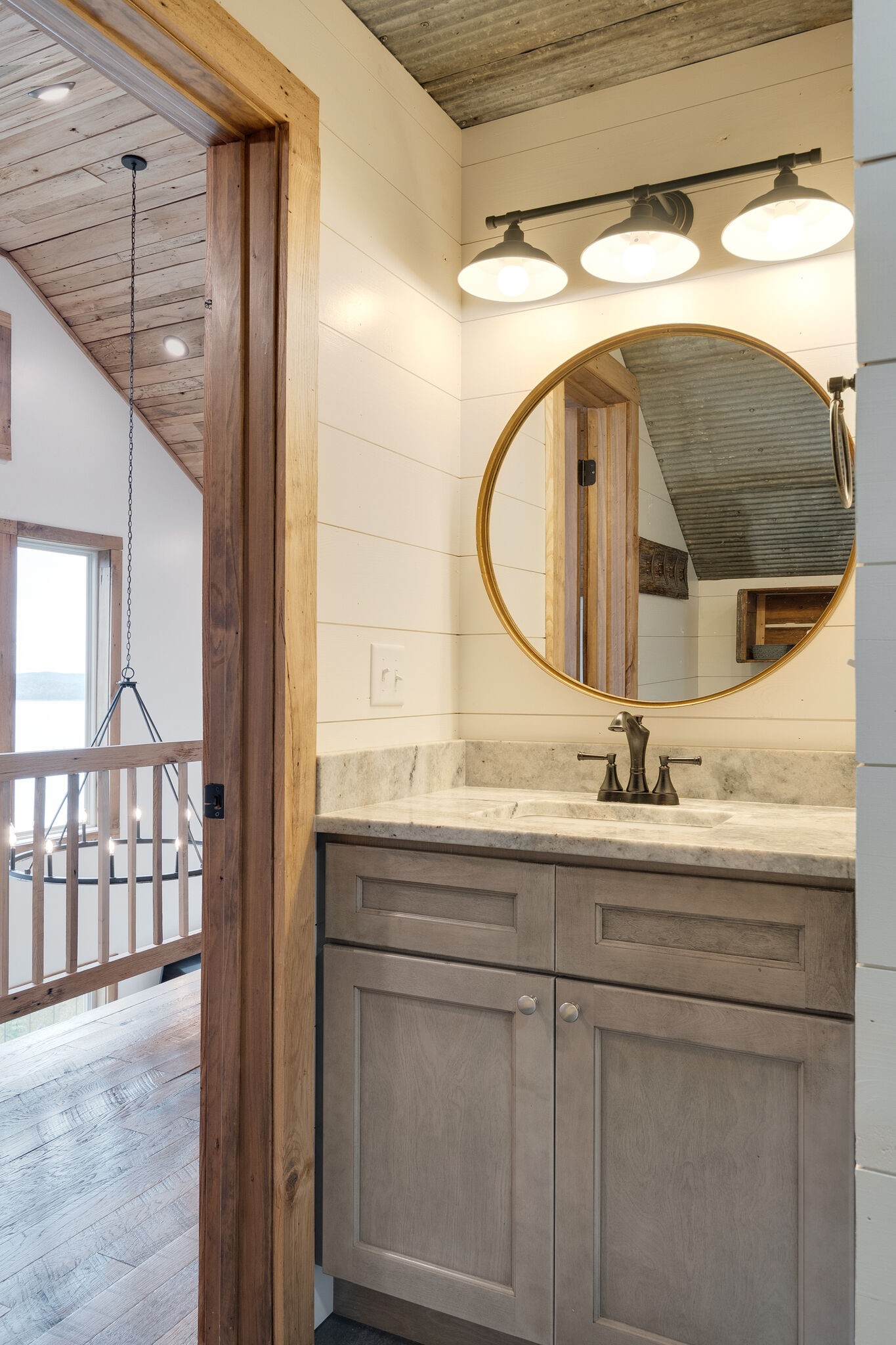 245 Nautilus Point Silver Point, TN 38582 - Photo 26 of 41 a bathroom with a sink and a mirror