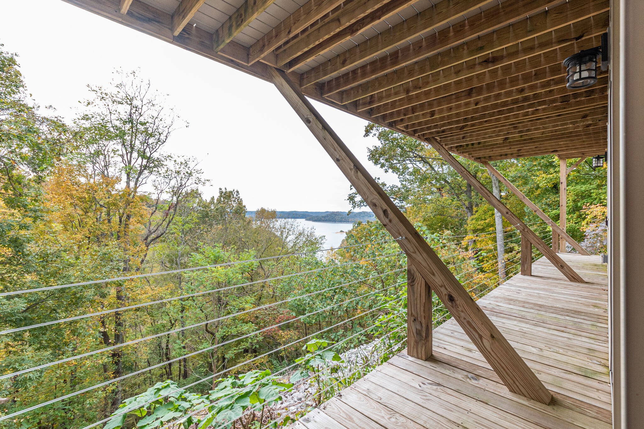 245 Nautilus Point Silver Point, TN 38582 - Photo 34 of 41 a view of a balcony with wooden floor and fence