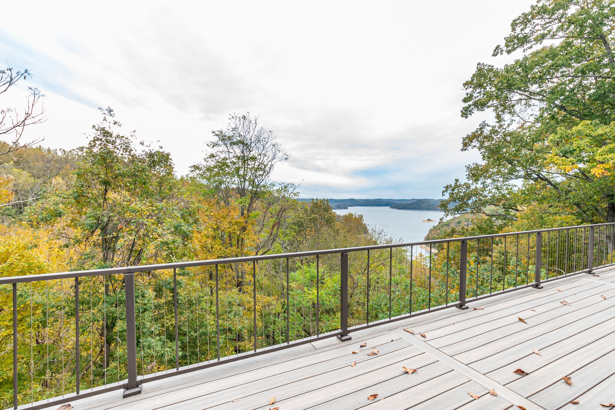 245 Nautilus Point Silver Point, TN 38582 - Photo 38 of 41 a view of a balcony with wooden floor and fence