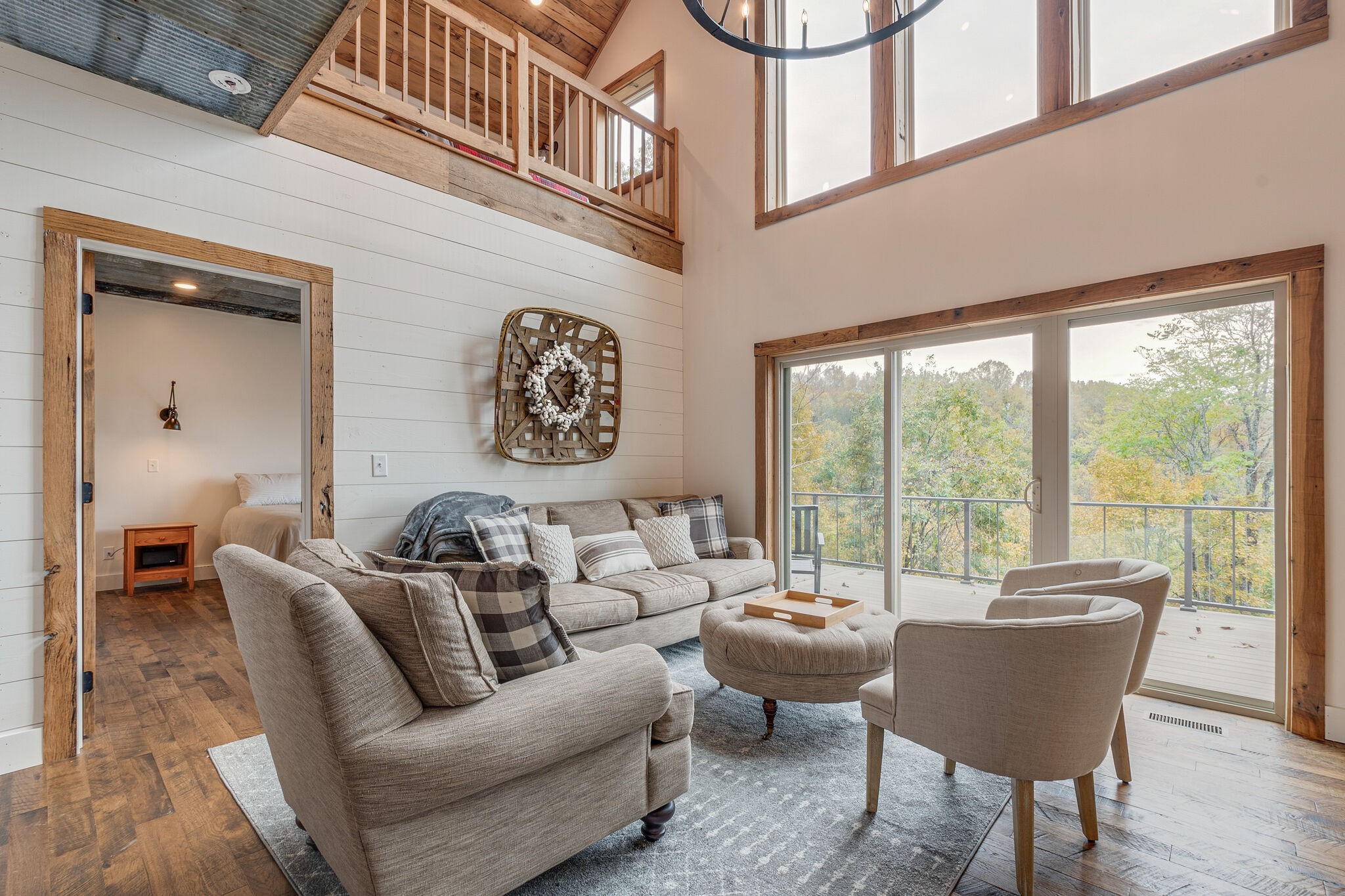 245 Nautilus Point Silver Point, TN 38582 - Photo 7 of 41 a living room with furniture and a large window