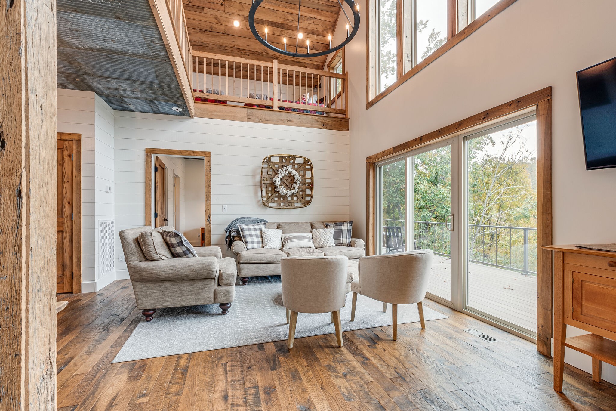 245 Nautilus Point Silver Point, TN 38582 - Photo 8 of 41 a living room with furniture and a large window