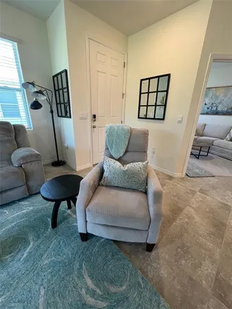 a living room with furniture and a couch