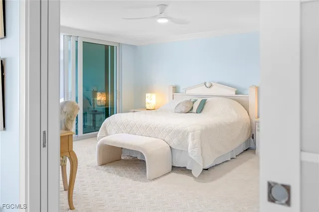 a bedroom with a bed and a mirror