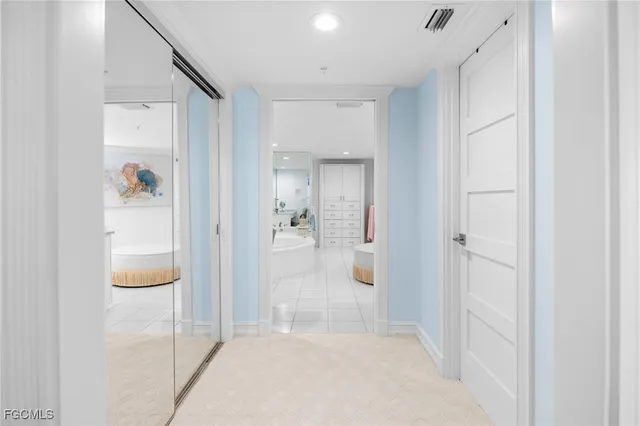 a bathroom with a shower and mirror