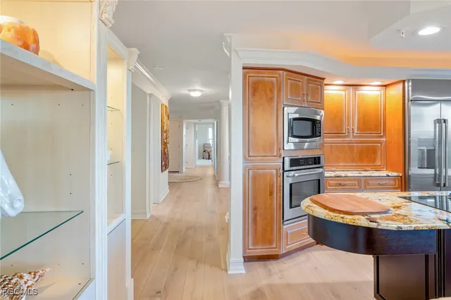 a bathroom with a tub a sink and a mirror