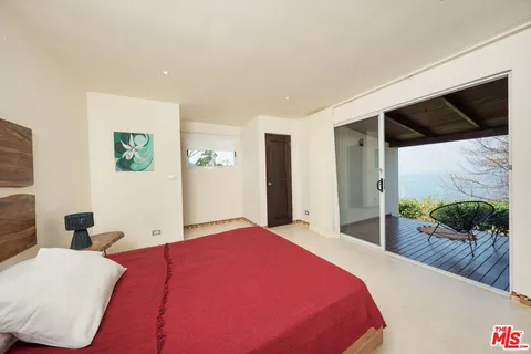 a view of roof with sitting area