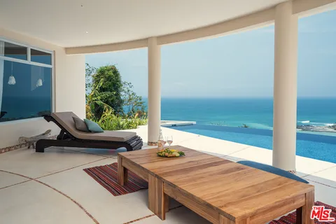 a vase of flowers sitting on a table