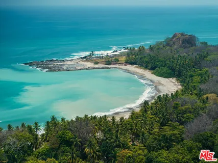 a view of a ocean with beach