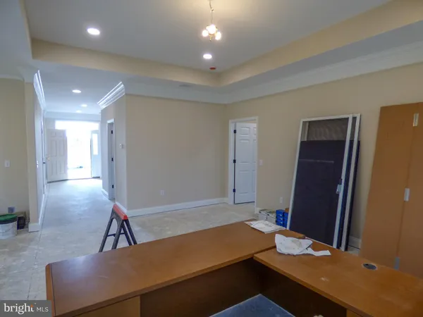 a room with furniture and window