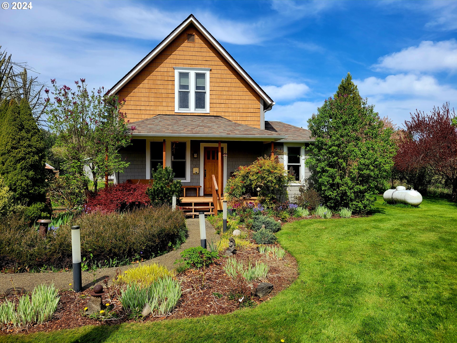 218 Hinkley Road Toledo, WA 98591 - Photo 1 of 31 a front view of a house with a yard and porch