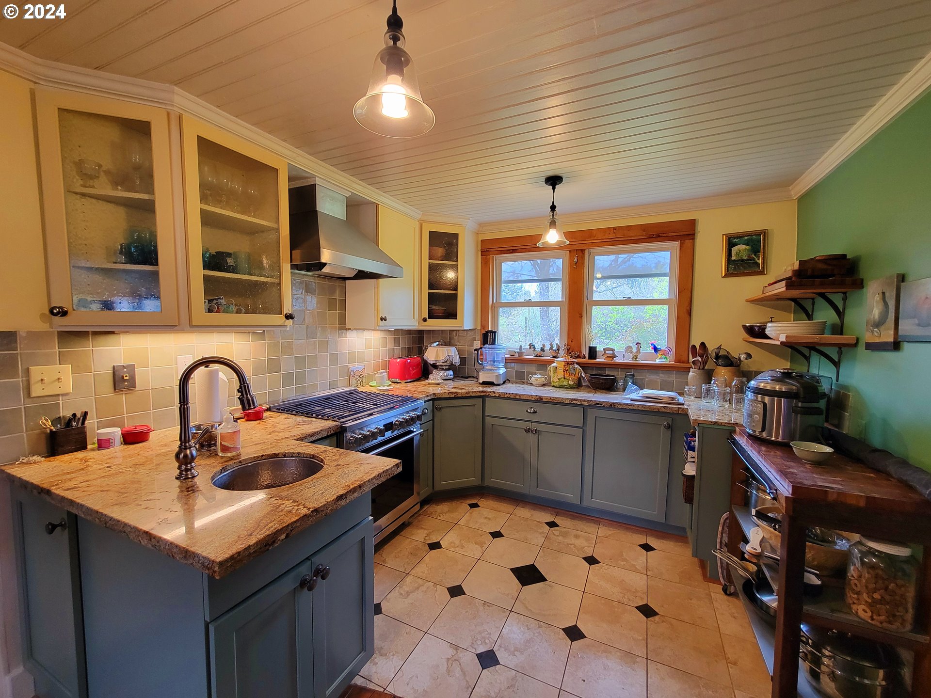 218 Hinkley Road Toledo, WA 98591 - Photo 17 of 31 a kitchen with a sink a stove and cabinets