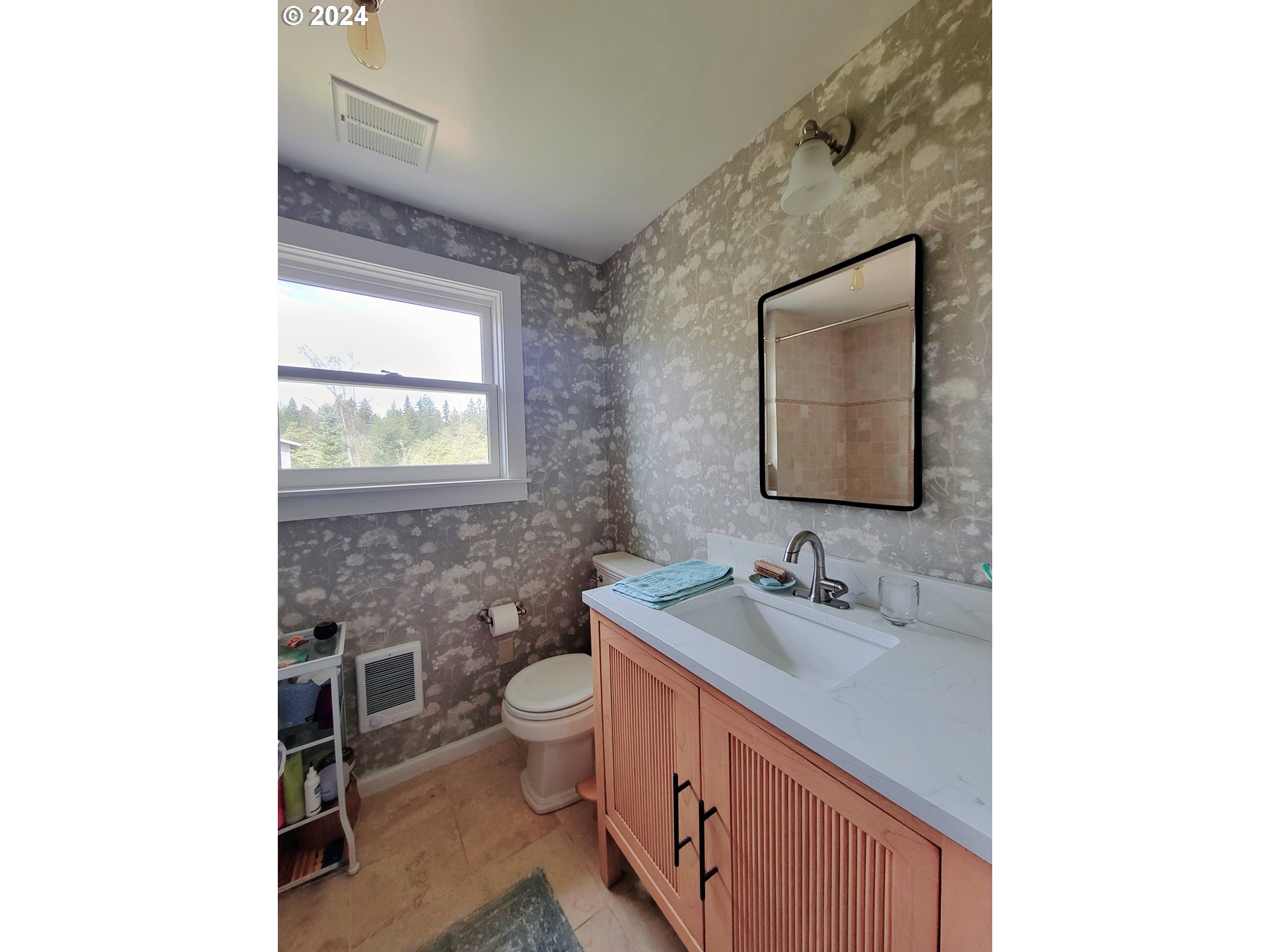 218 Hinkley Road Toledo, WA 98591 - Photo 24 of 31 a bathroom with a toilet sink and mirror