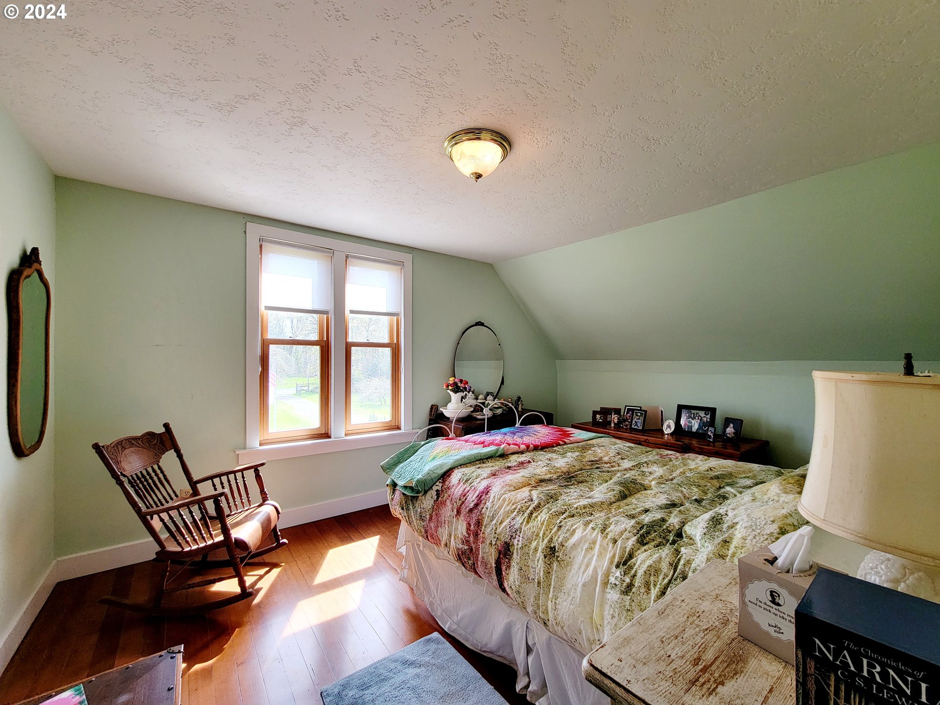 218 Hinkley Road Toledo, WA 98591 - Photo 7 of 31 a bedroom with a bed chair and window