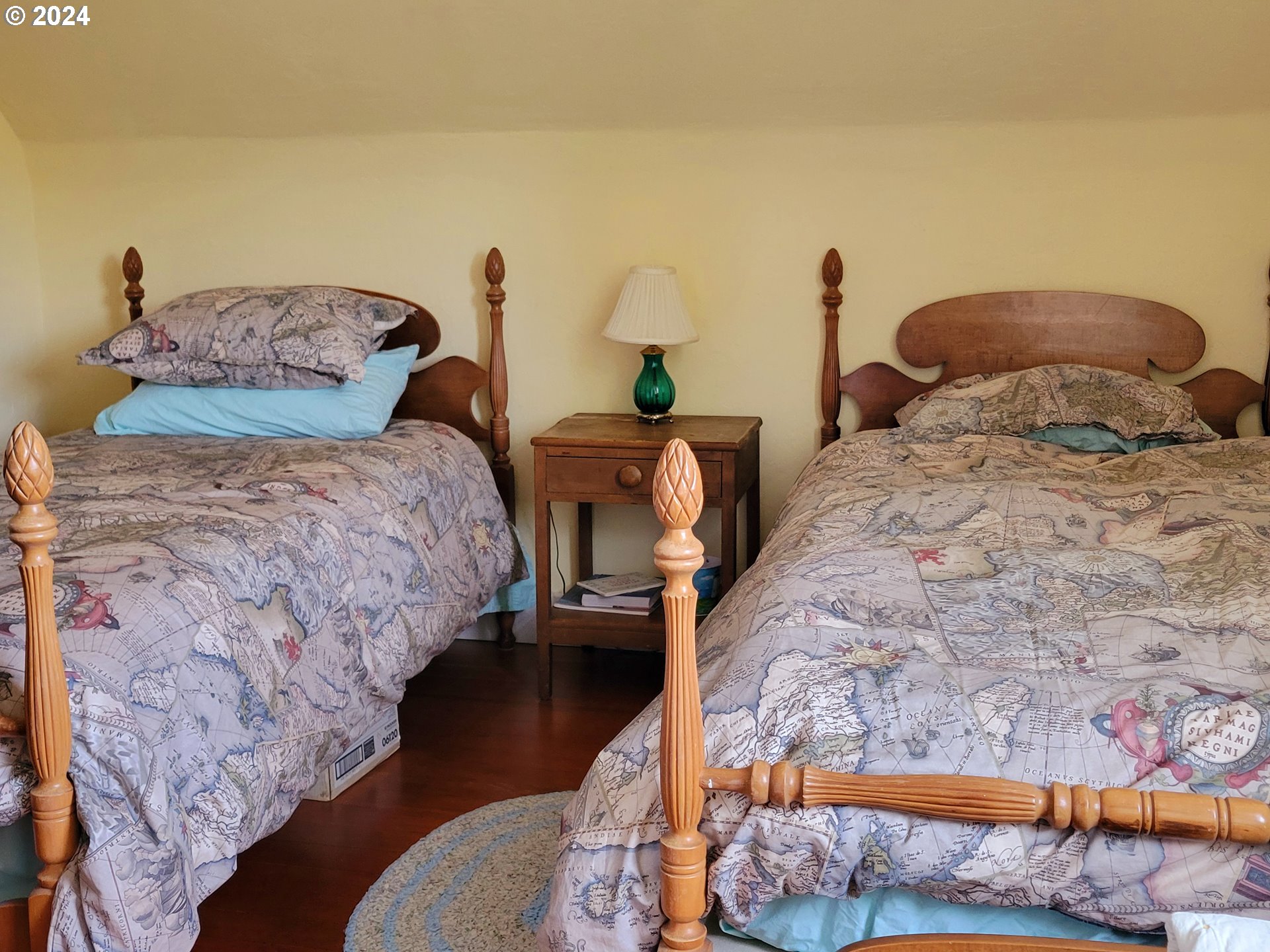 218 Hinkley Road Toledo, WA 98591 - Photo 8 of 31 a bedroom with bed and wooden floor